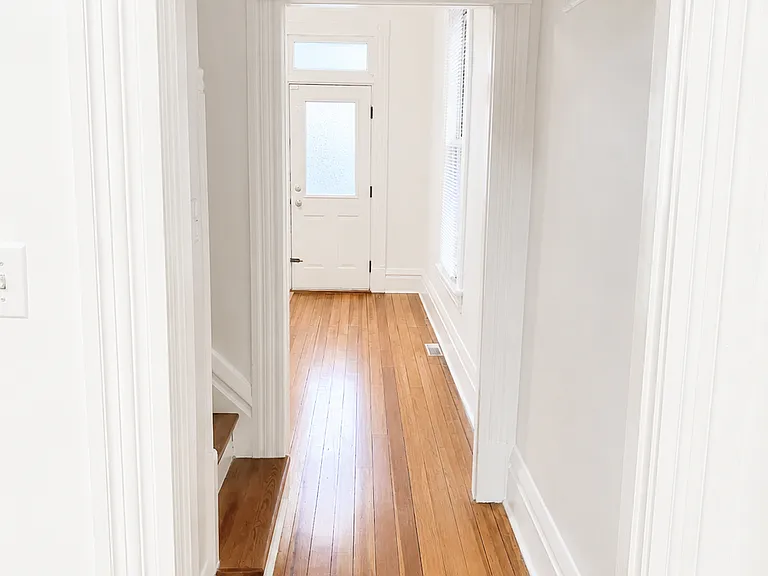Hallway looking to front door.