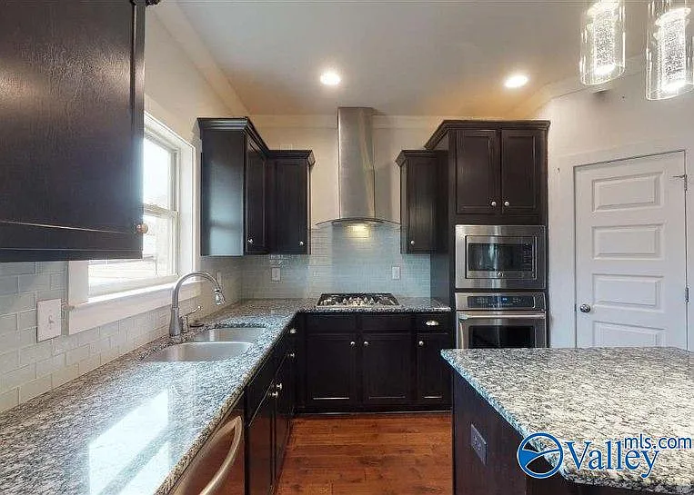 7601 Ashor Dr NW — Photo 18