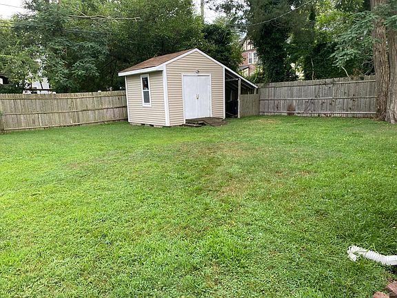 Back yard and storage shed.