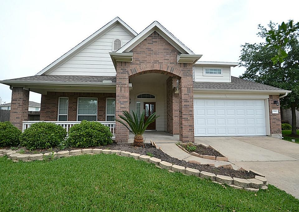 Front view of this exceptional home located on a quiet cul-de-sac lot at 21006 Silver Rawls Ln.