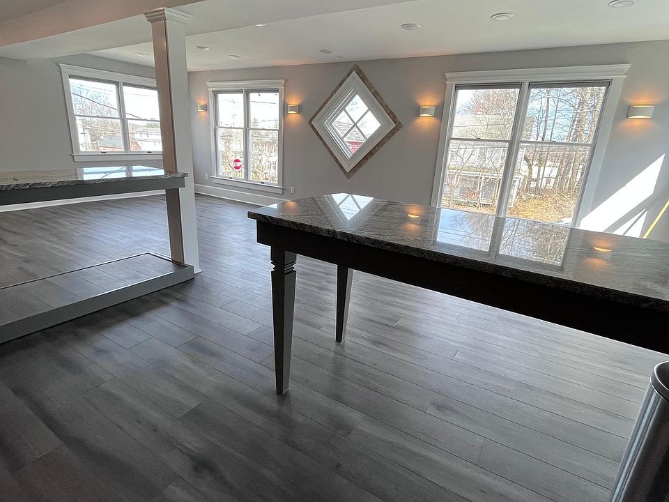 Living room, kitchen, and dining area
