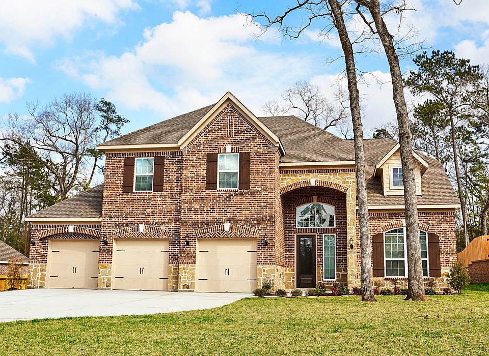 Featuring a stone and brick exterior with gorgeous wooden shutters