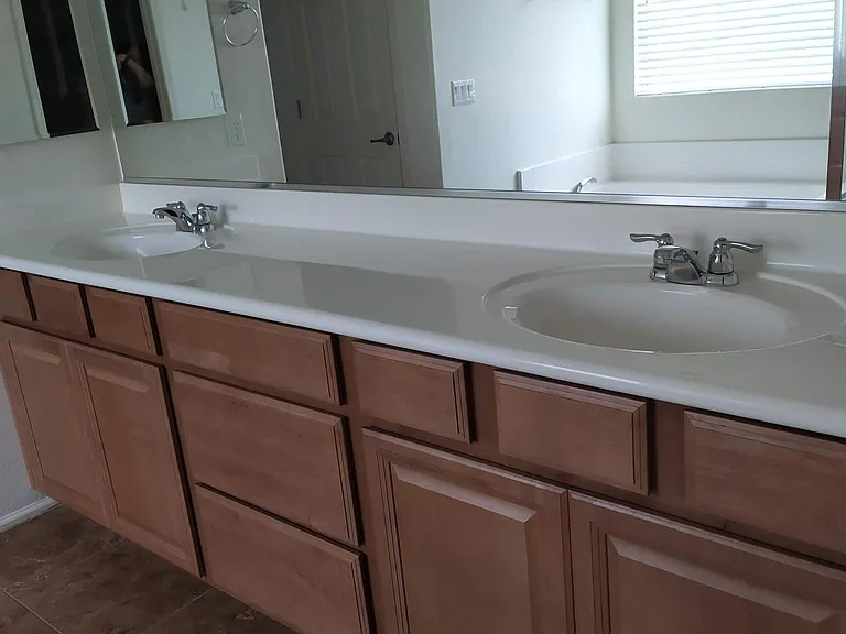 Double sinks and vanity in master bathroom