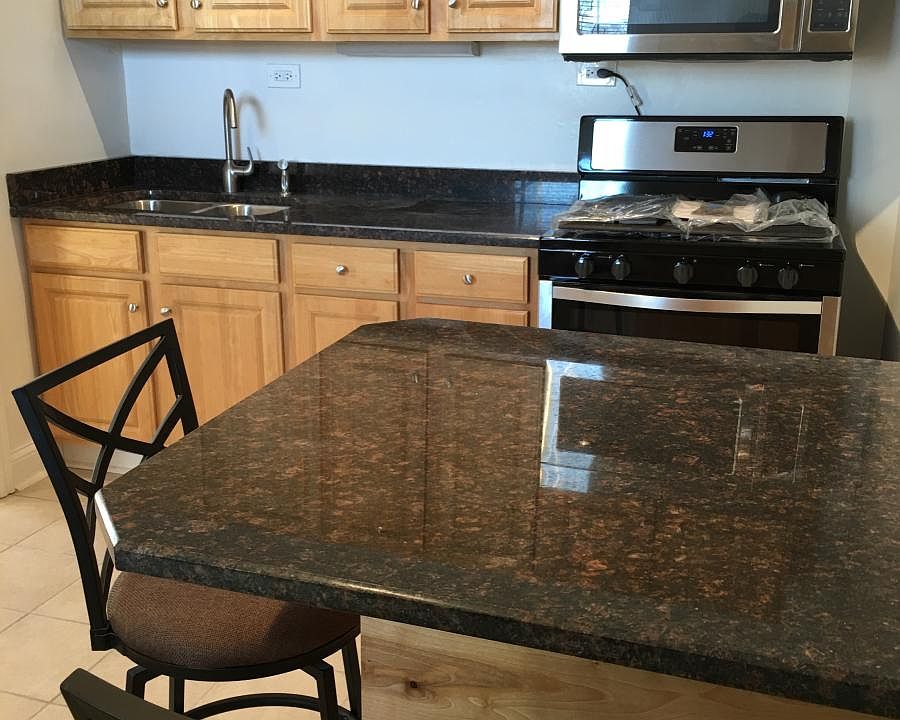 New granite counters and cabinets