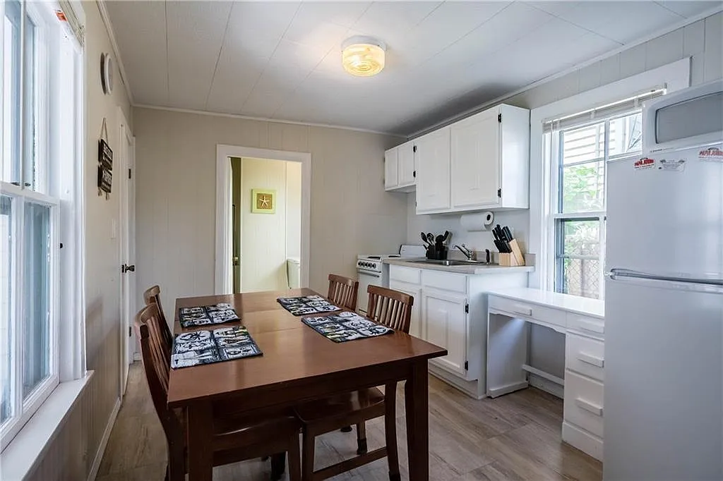Kitchen equipped with all essentials including pots, pans, b