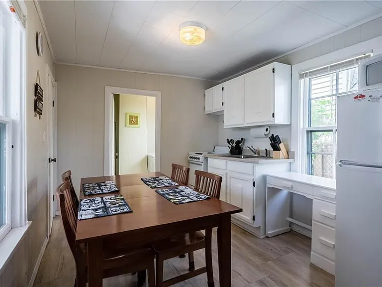 Kitchen equipped with all essentials including pots, pans, b
