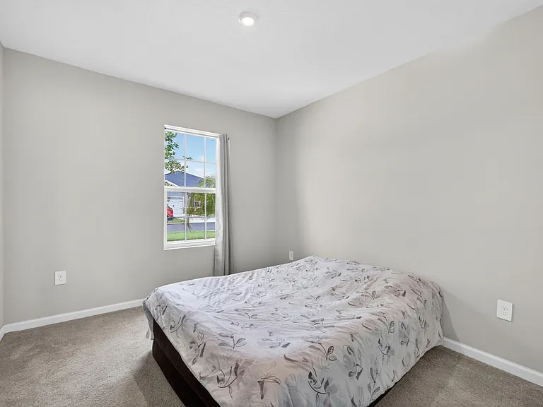 9449 SW Libertas Way — Photo 25