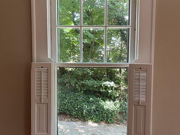 living room window with shutters