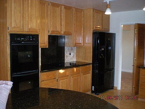 Kitchen, granite countertops, black appliances