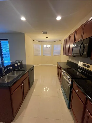10417 SW 231st Ter Photo 1