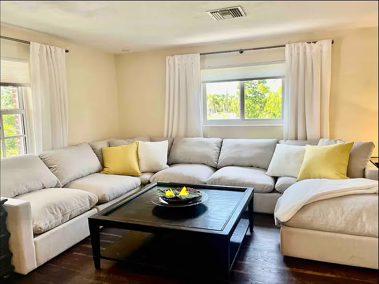 Enjoy this comfortable sectional sofa that can be rearranged to your liking. It has deep seating and it's perfect for enjoying or entertaining in this warm and spacious setting.