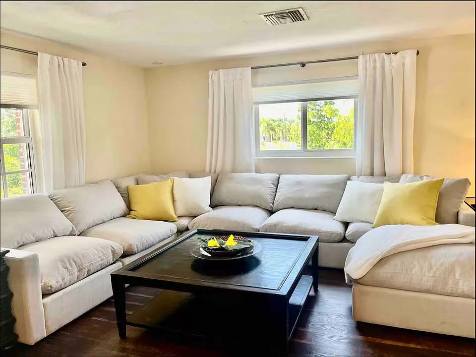 Enjoy this comfortable sectional sofa that can be rearranged to your liking. It has deep seating and it's perfect for enjoying or entertaining in this warm and spacious setting.