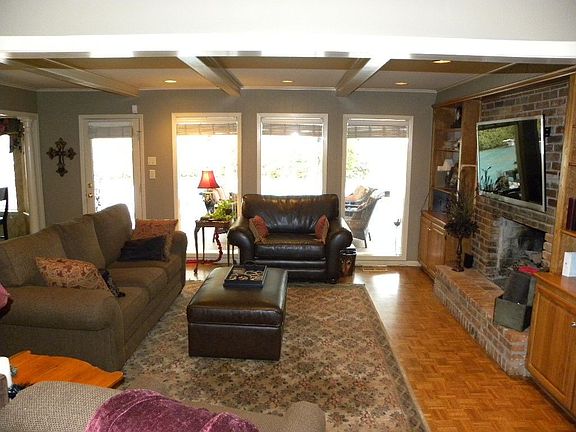 Family room overlooks pool