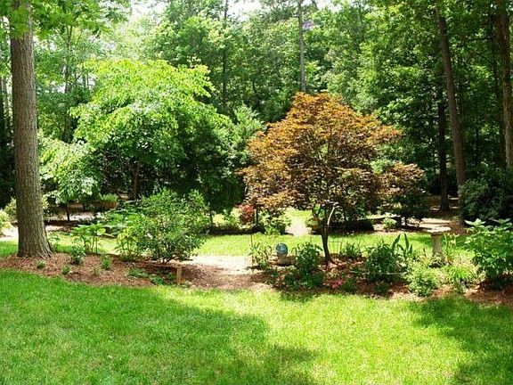 Gorgeous Private Back Yard has Room for Playing and Gardening!