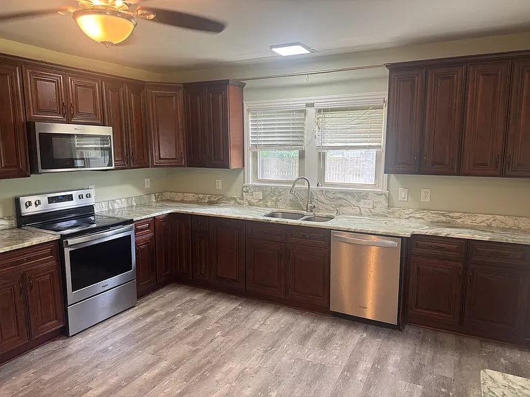Kitchen: Updated kitchen with stainless-steel appliances and dishwasher
