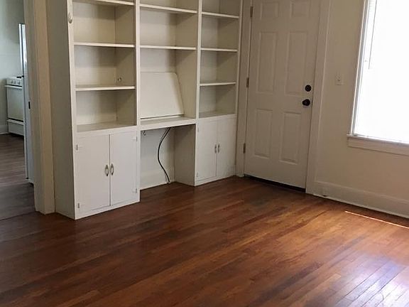 Hardwood floors, closets and living room built-ins