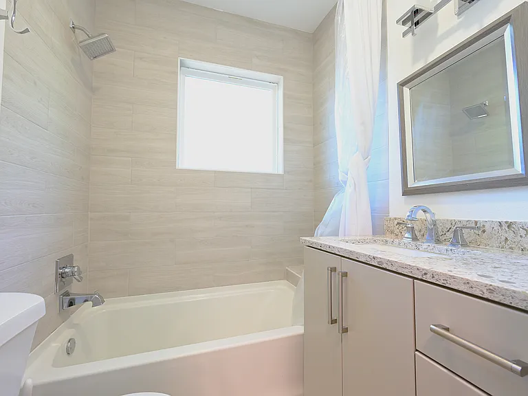 Updated bath with tub.