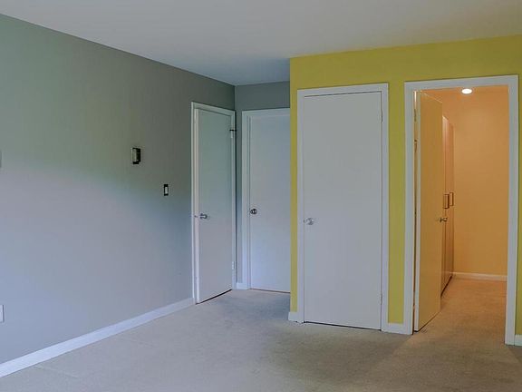 Master Bedroom with large walk-in closet + additional deep storage/closet
