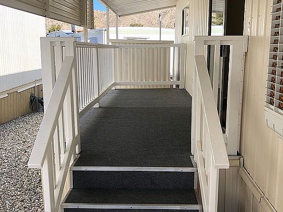 Newly carpeted covered patio