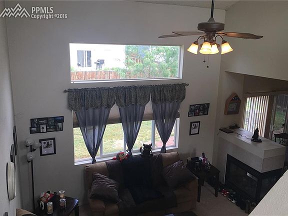 living room with vaulted ceilings