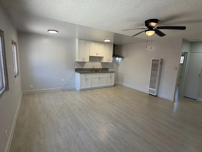 9619 S Hoover St — Photo 6