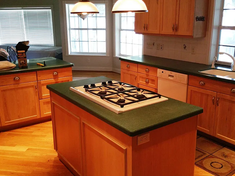 This is the center island in the kitchen with all windows overlooking the lake