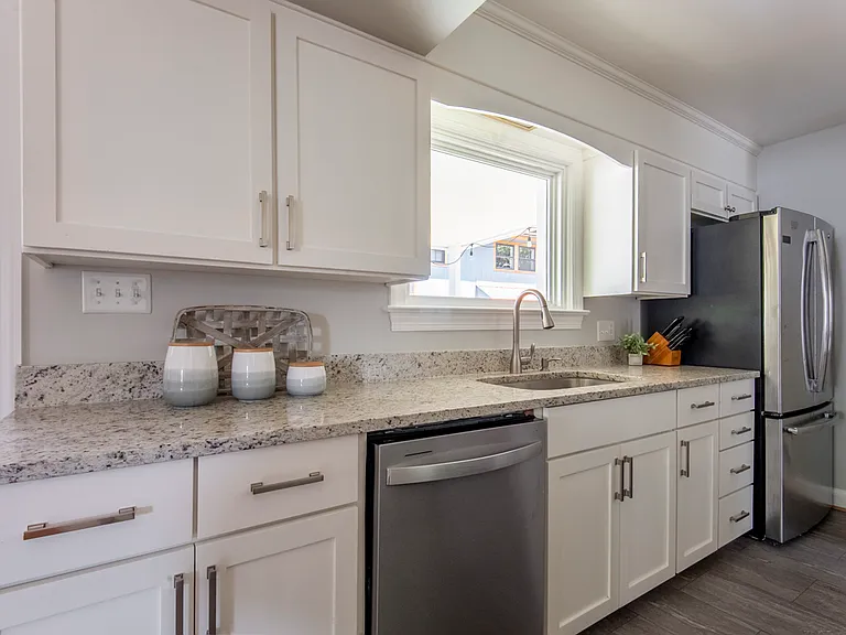 Granite countertops and new stainless steel appliances