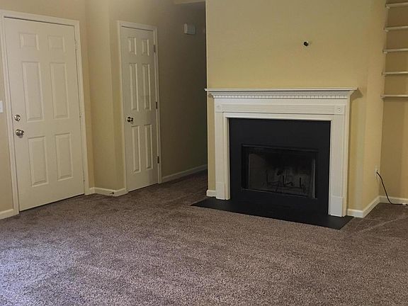 Family room with wood-burning fireplace