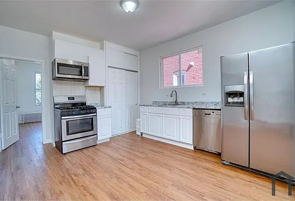 6039 Maspeth Ave #2 — Photo 1
