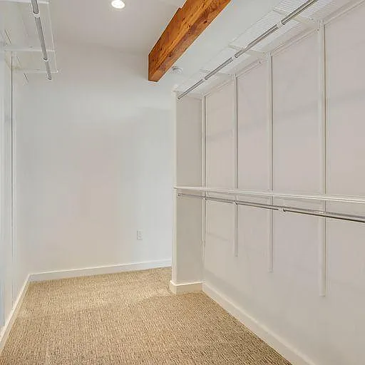 ELFA Shelving in huge walk-through closet can be adjusted &/or expanded. 3202 "The Edward" Loft