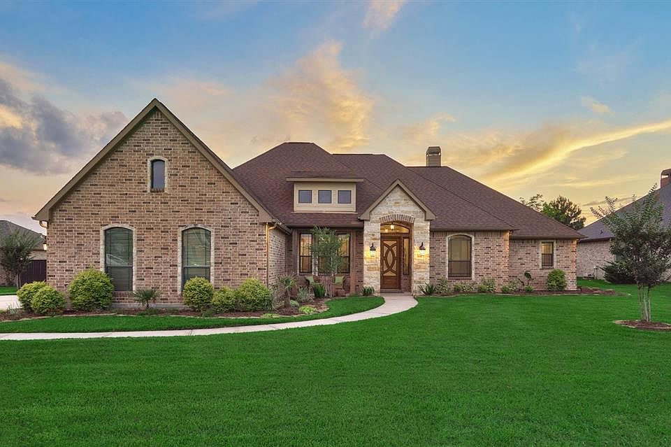 Welcome home to 11715 W Grand Pond Drive!