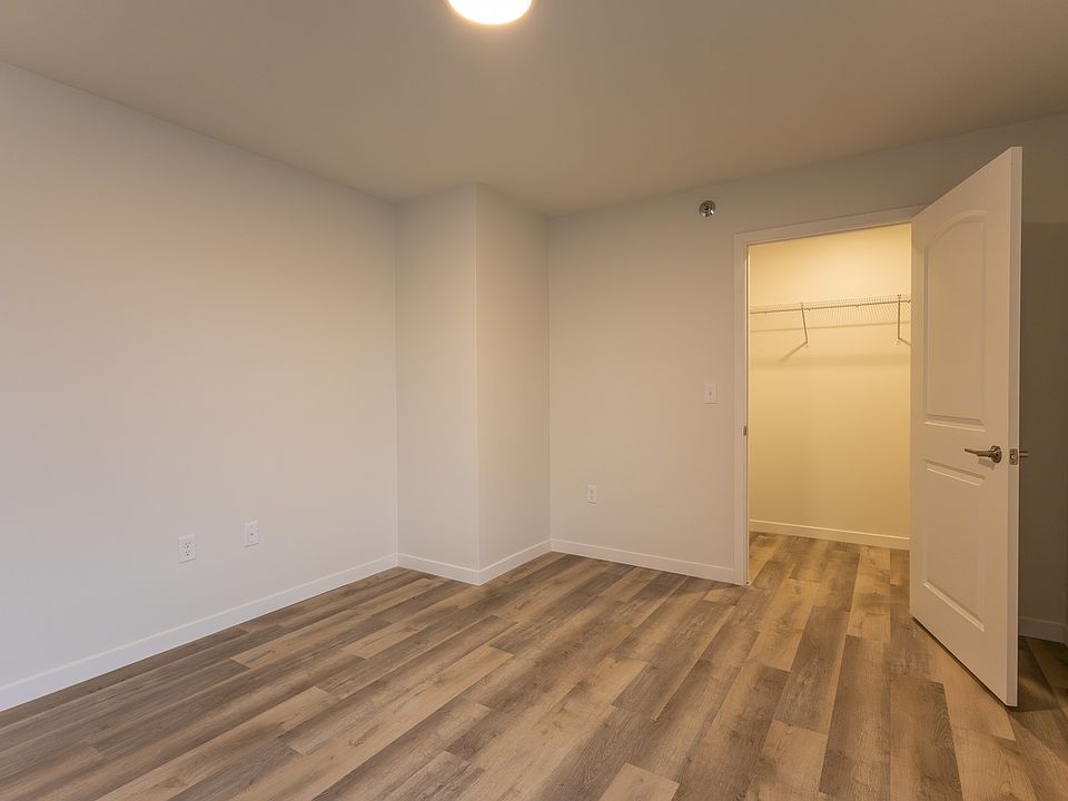 Bedroom with large walk-in closet. Taken during construction in September 2025. Please excuse our mess.