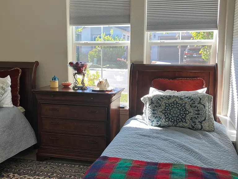 Bedroom #2 has several windows that bring natural light to this room