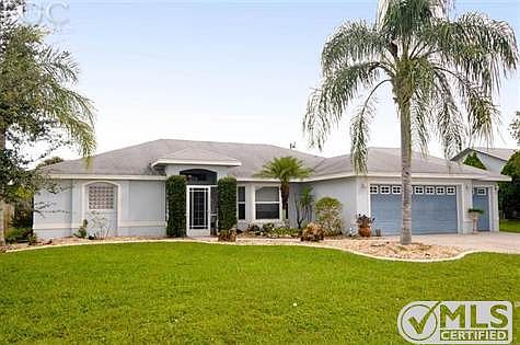 2 Car Garage and 1 Golf Cart or Lawn Mower utility Garage on side / possible Workshop