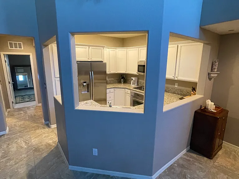 Open face kitchen faces the dining room and living room, creating a bright, seamless flow that makes everyday living easy and comfortable .