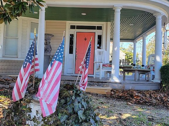 Front porch w swing for your coffee!