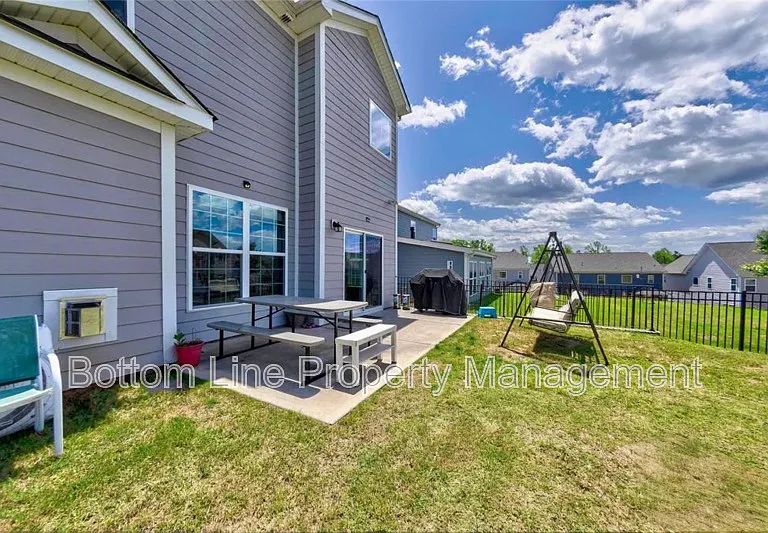 9576 Herringbone Ln NW — Photo 2