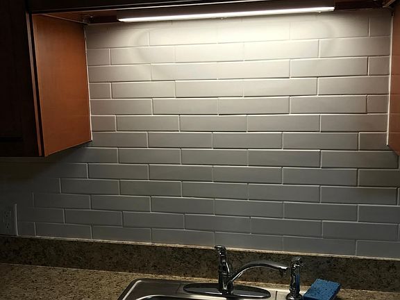 New kitchen sink and tile