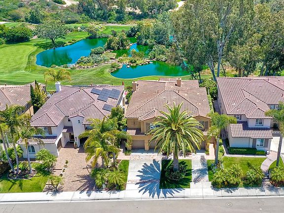 Areal shot of home with 180 degree views of lakes and 14th signature hole