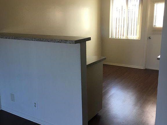 View into kitchen from living room.