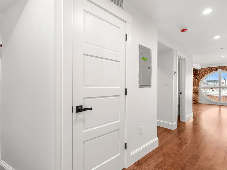 View from Entrance to Kitchen on left and Living room Circular window strait ahead