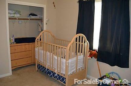 Bedroom 1 of 3
						:
						The bedrooms include spacious closets and plenty of space for a guest bed.