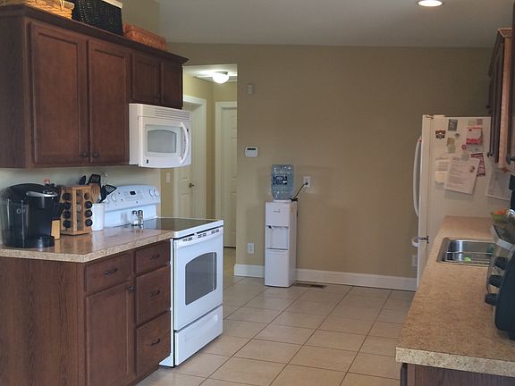 Tiled kitchen with pantry