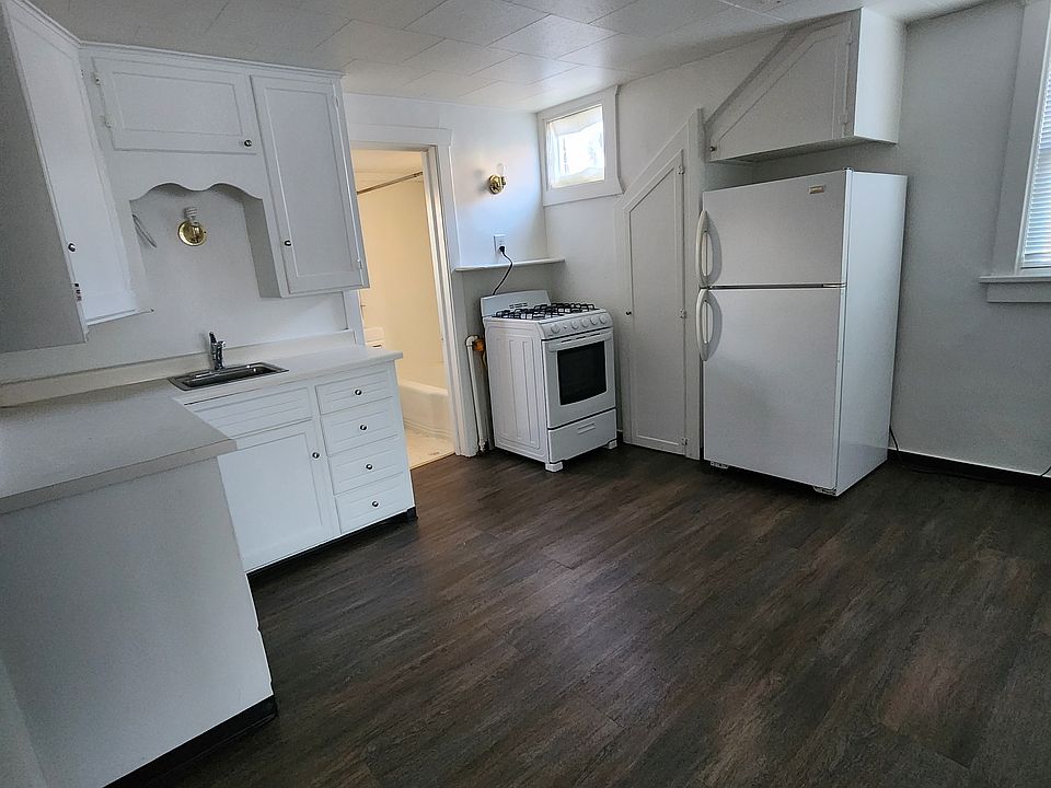 Kitchen photo taken from living room entrance to kitchen.