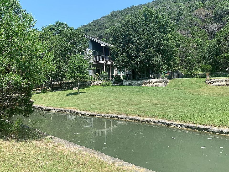 Front pond, yard and home