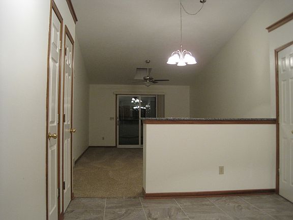great room with catheral ceiling off kitchen