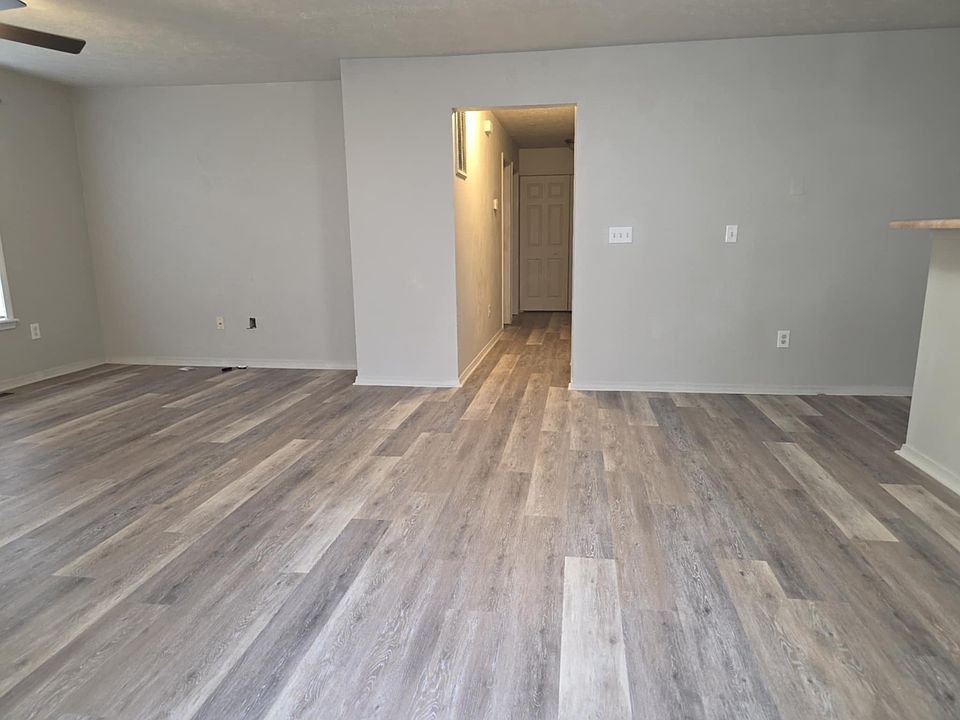 View from front door entry. Living room on left, dining room on right.