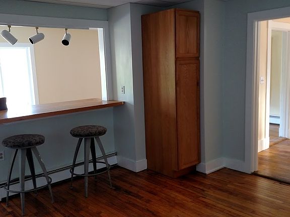 open plan for kitchen into LR and front entry on right
