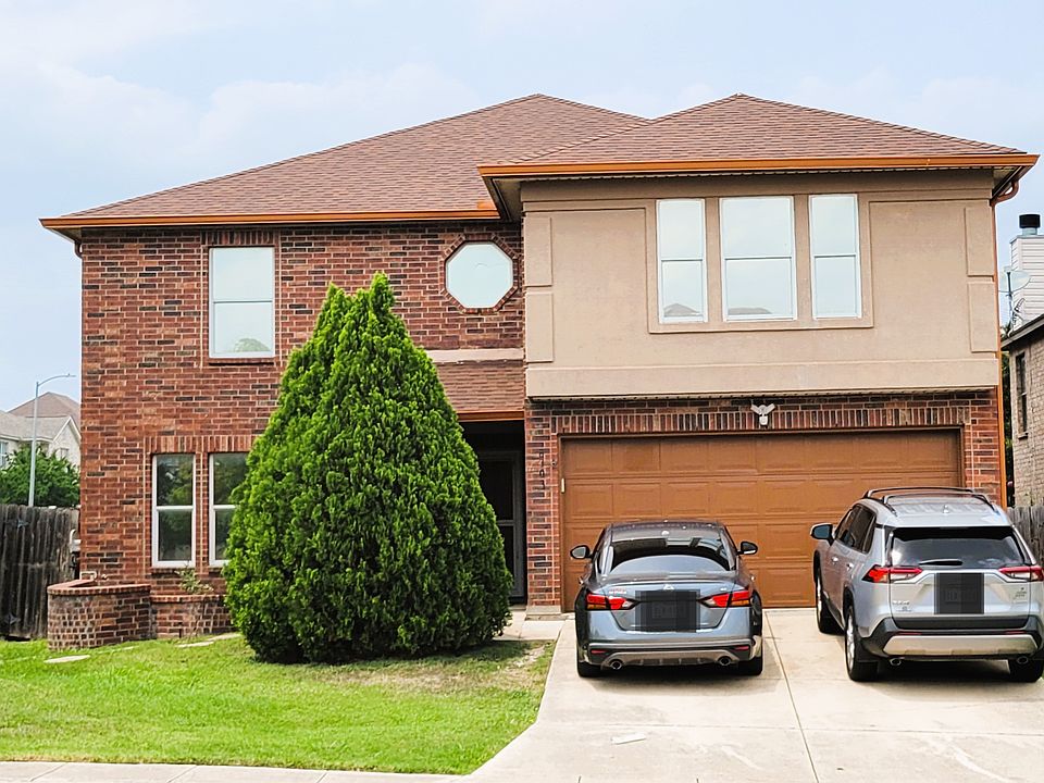 Front of Home. Backyard Patio with Outdoor Patio Set