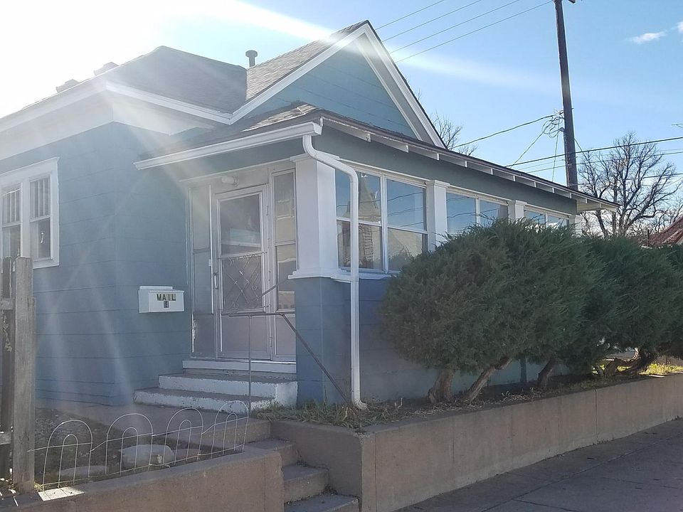 Covered front porch and entrance to the front door
